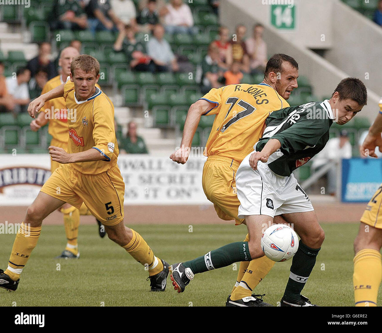 Plymouth striker Ian Stonebridge goes past Stockport defenders Robert Jones (centre) and Robert Clare during their Nationwide Division Two match at Plymouth's Home Park ground. NO UNOFFICIAL CLUB WEBSITE USE. Stock Photo