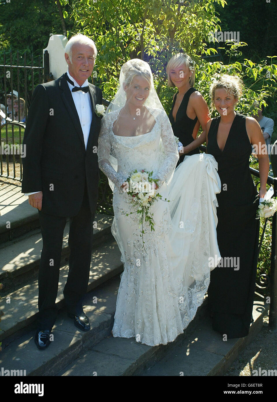 Davinia Taylor arrives for her wedding to David Gardener with her ...
