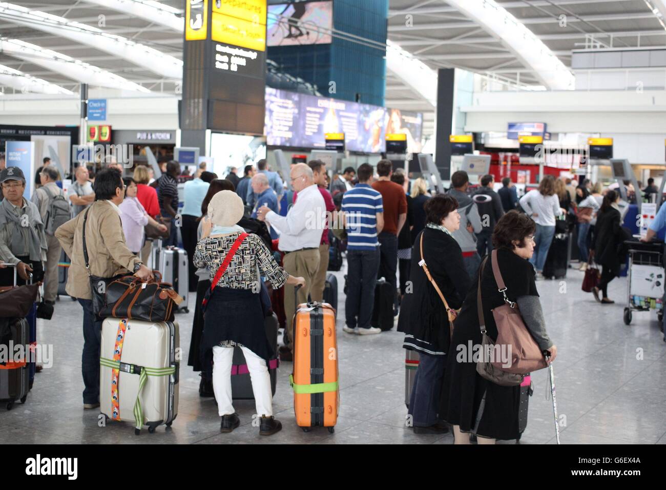 Air passengers check in at heathrows terminal 5 hires stock