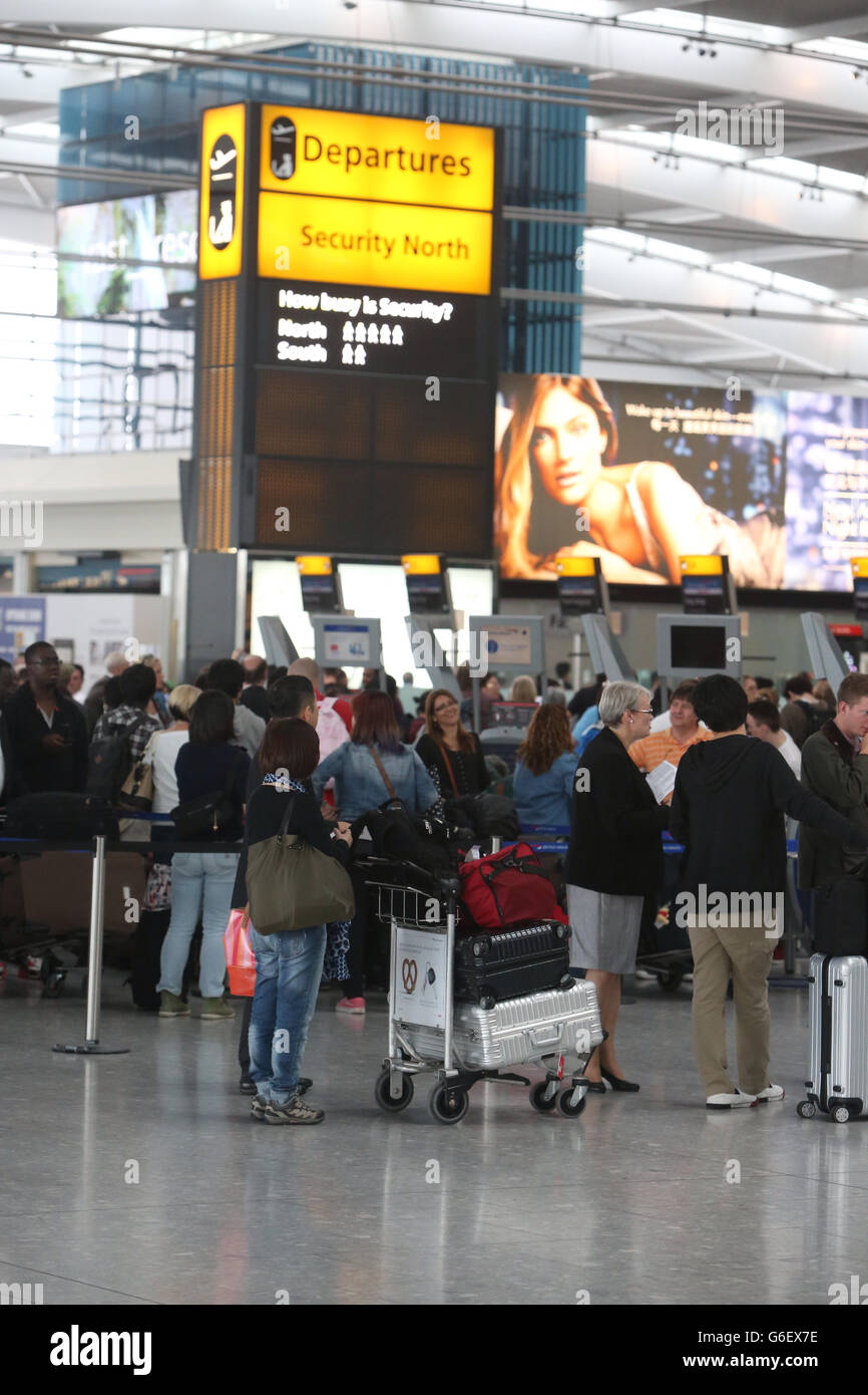 Air passengers check in at heathrows terminal 5 hires stock