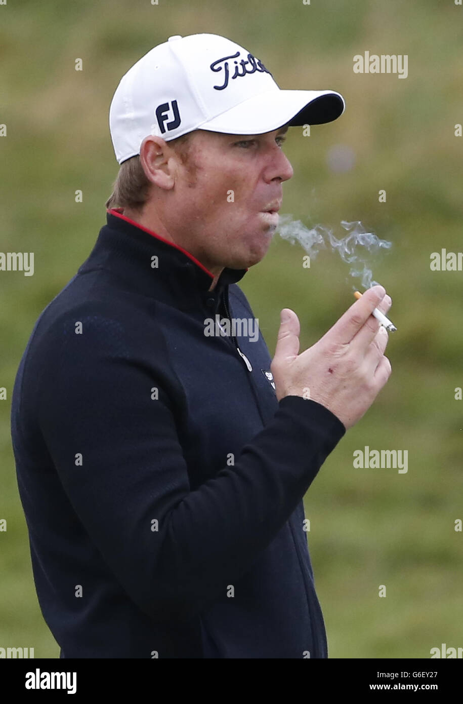 Golf - 2013 Alfred Dunhill Links Championship - Day Two - Carnoustie. Shane Warne during day Two of the 2013 Alfred Dunhill Links Championships at Carnoustie Golf Course. Stock Photo