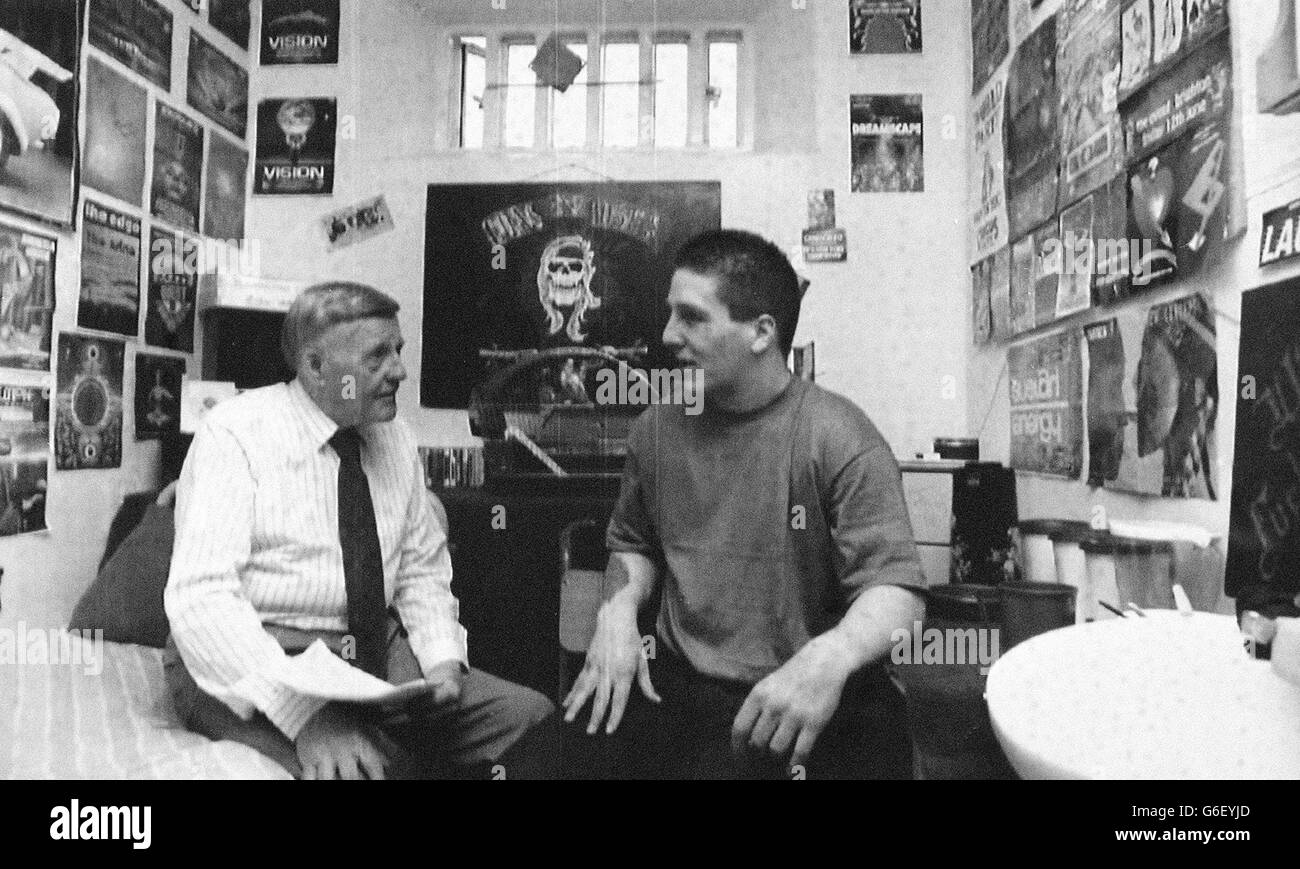 Jimmy Young at Dartmoor.. Jimmy Young in a cell with John for his radio programme at Dartmoor Prison. Stock Photo