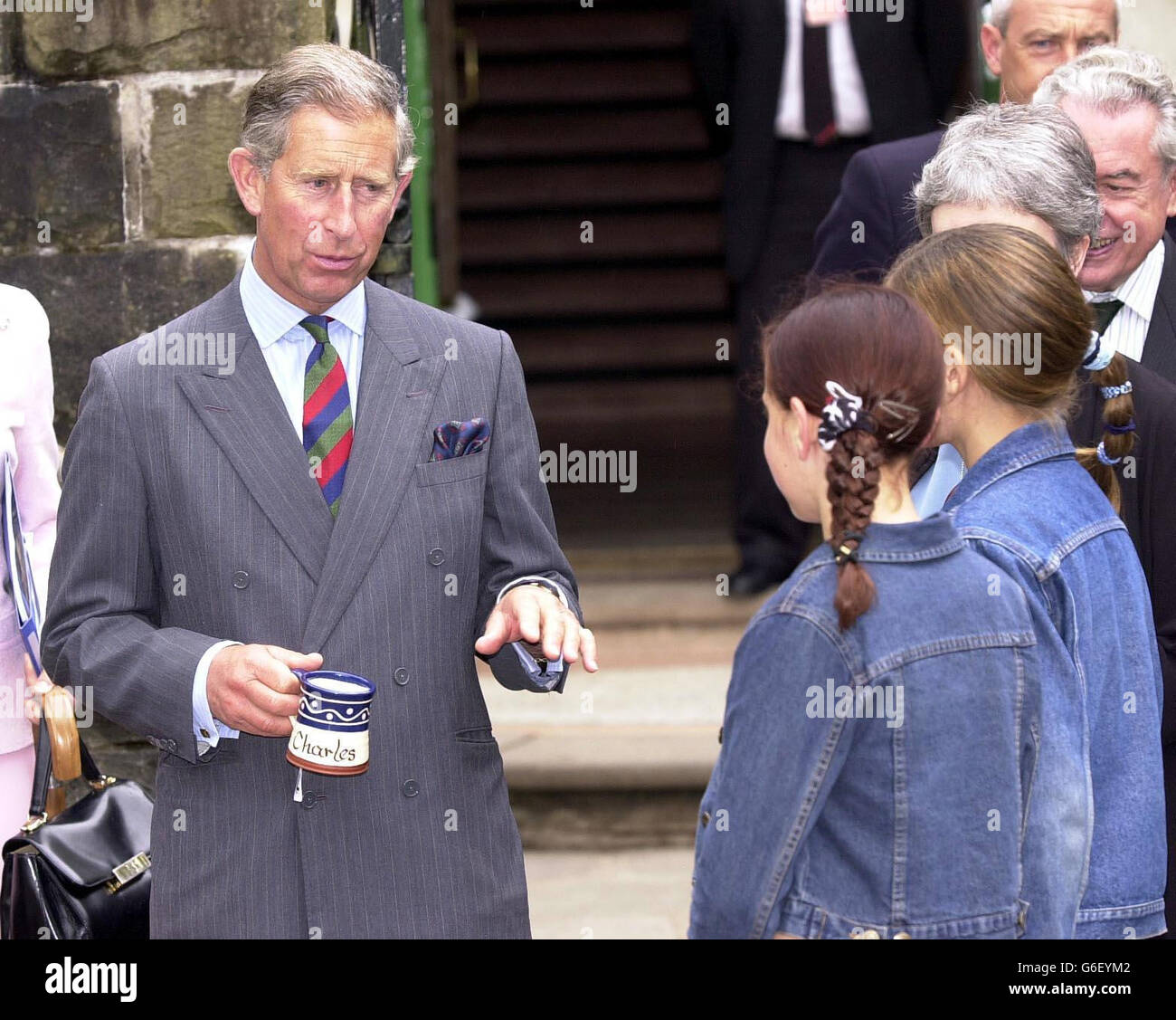 The Prince of Wales speaks to (from left-right) Georgina Lloyd Jones ...