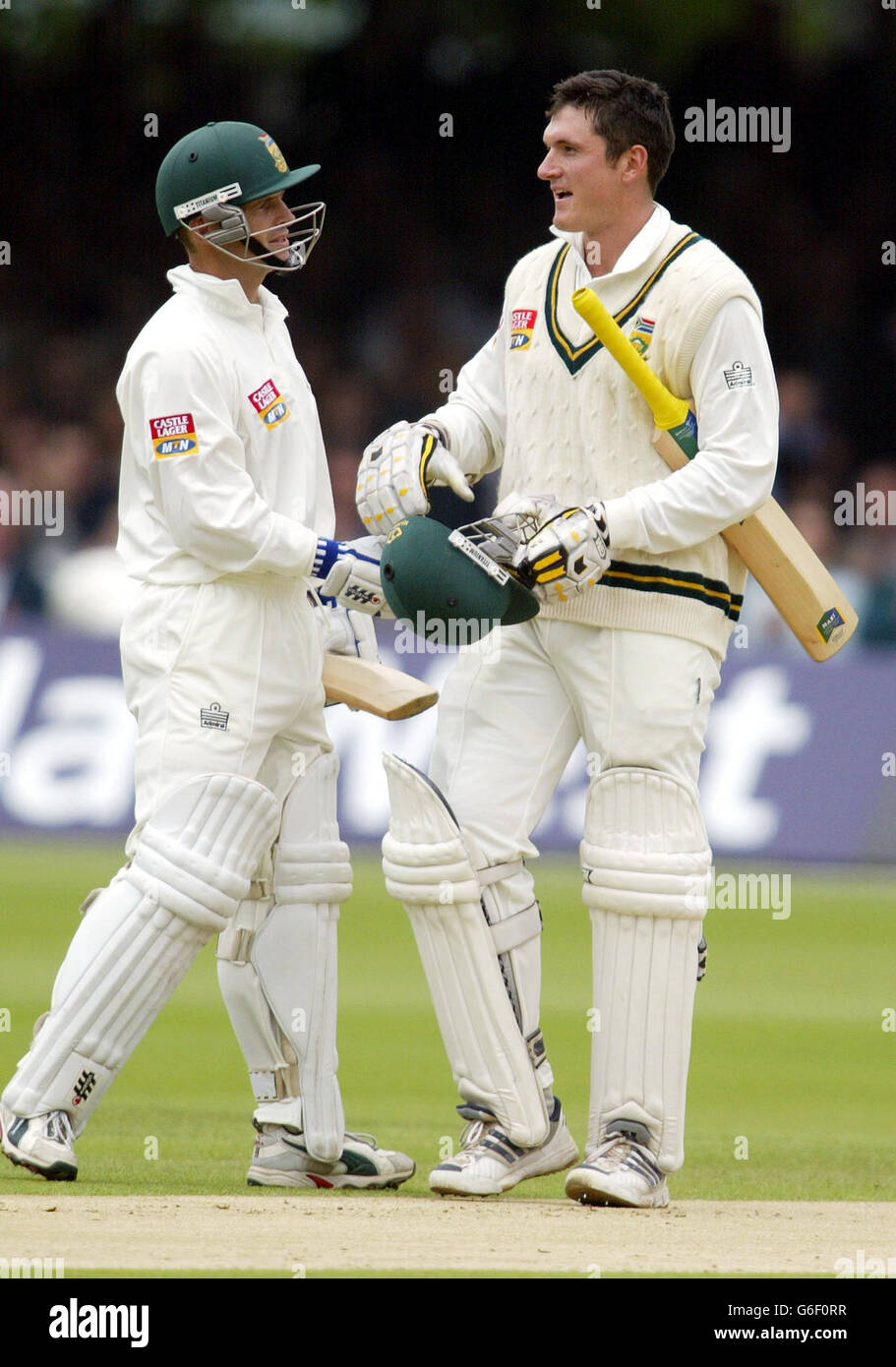 South Africa's Gary Kirsten (left) congratulates captain Graeme Smith on his second successive Test century against England during the second day of the second nPower Test at Lord's Cricket Ground. Stock Photo