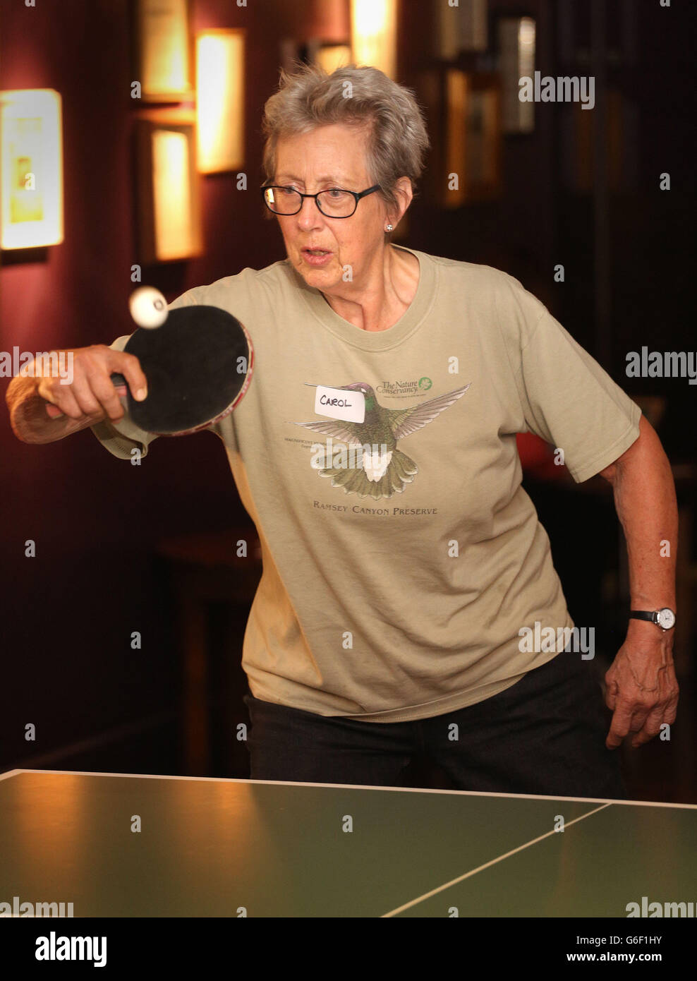 Carol Bateman, 74, plays table tennis on Older People's day in the Ping