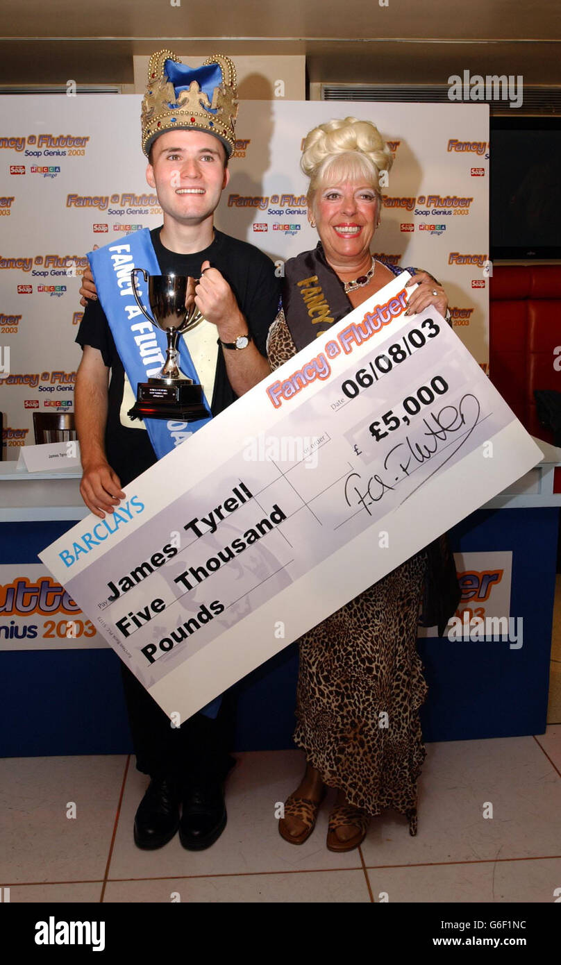 Former Coronation Street actress Julie Goodyear with the Fancy a Flutter Soap Genius 2003 winner James Tyrell, aged 18 from the Wirral at the final of Fancy a Flutter Soap Genius 2003, held at the Hard Rock Cafe in central London. Stock Photo