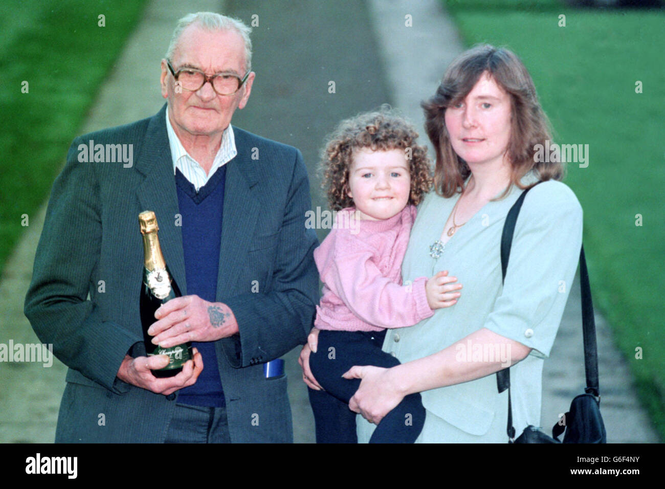 Joint National Lottery Jackpot winners George Snell and his daughter Patricia Marden at Moor Park Golf Club, Rickmansworth, where they faced the media for the first time since they won 800,000 ponds between them. Patricia's daughter, Katy, is also pictured. Stock Photo