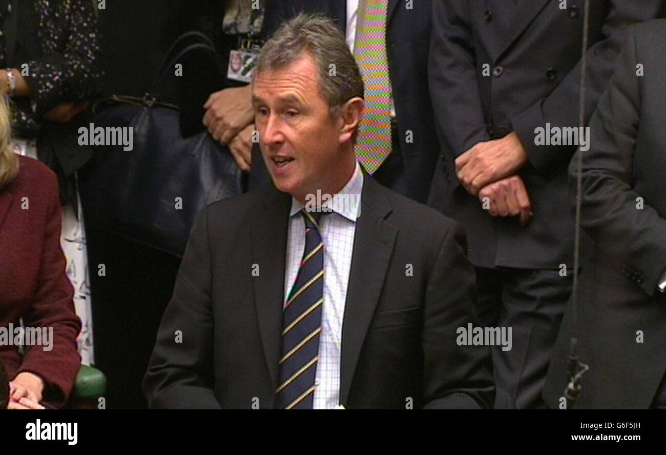 MP Nigel Evans asks a question during Prime Minister's Questions in the House of Commons, London. Stock Photo