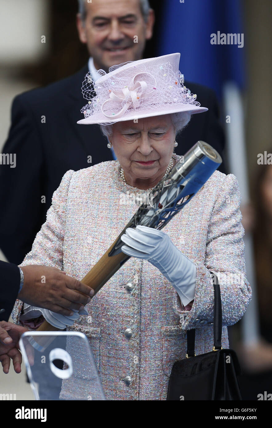 Queen Elizabeth II places her message to the Commonwealth Games in the