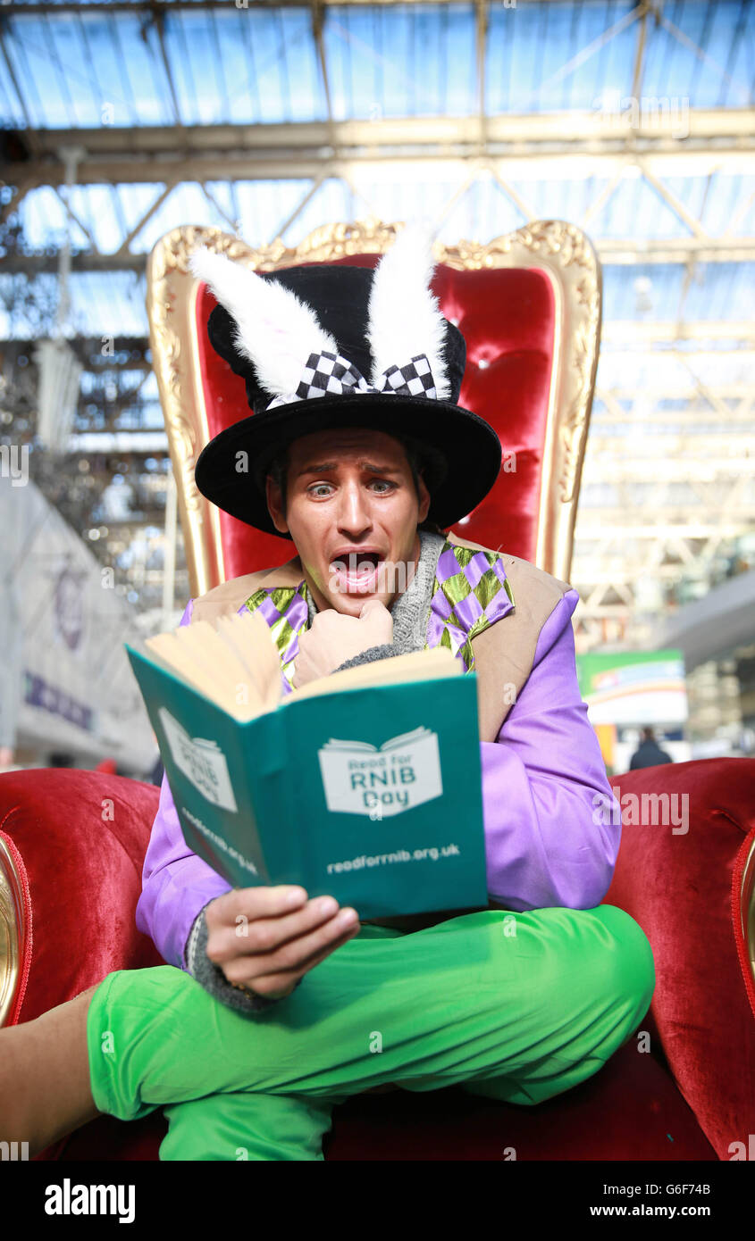 s classic, Alice's Adventures in Wonderland book to mark Read for RNIB day, the annual charity event from The Royal National Institute of Blind People (RNIB). Stock Photo