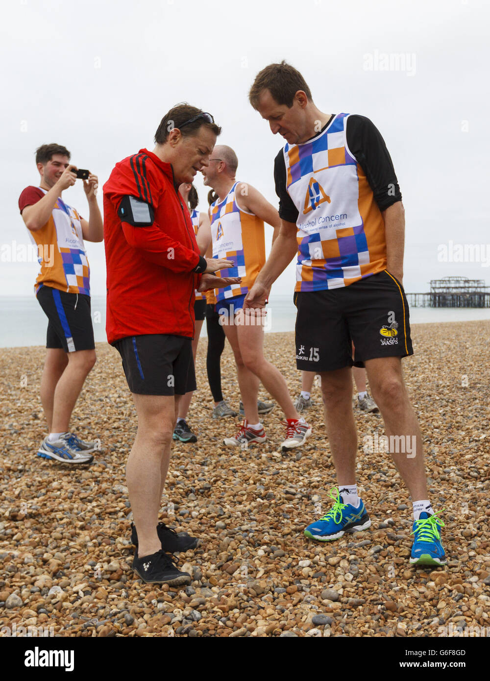 Former Downing Street spin doctor Alastair Campbell (right) looks a