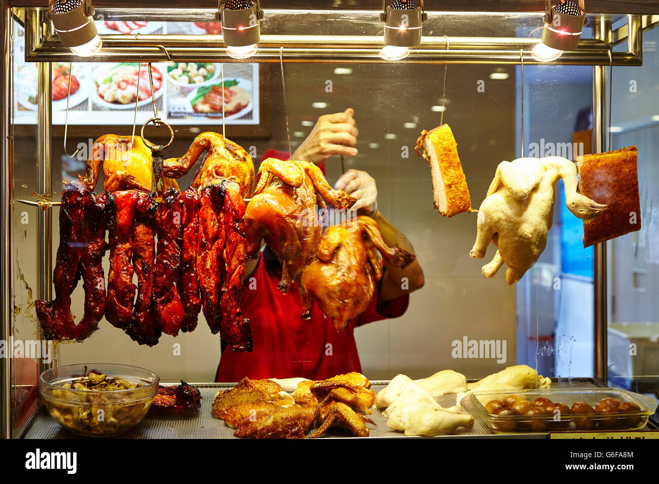 Roasted Chicken Rice and Pork in a Singapore Hawker Stall Stock Photo