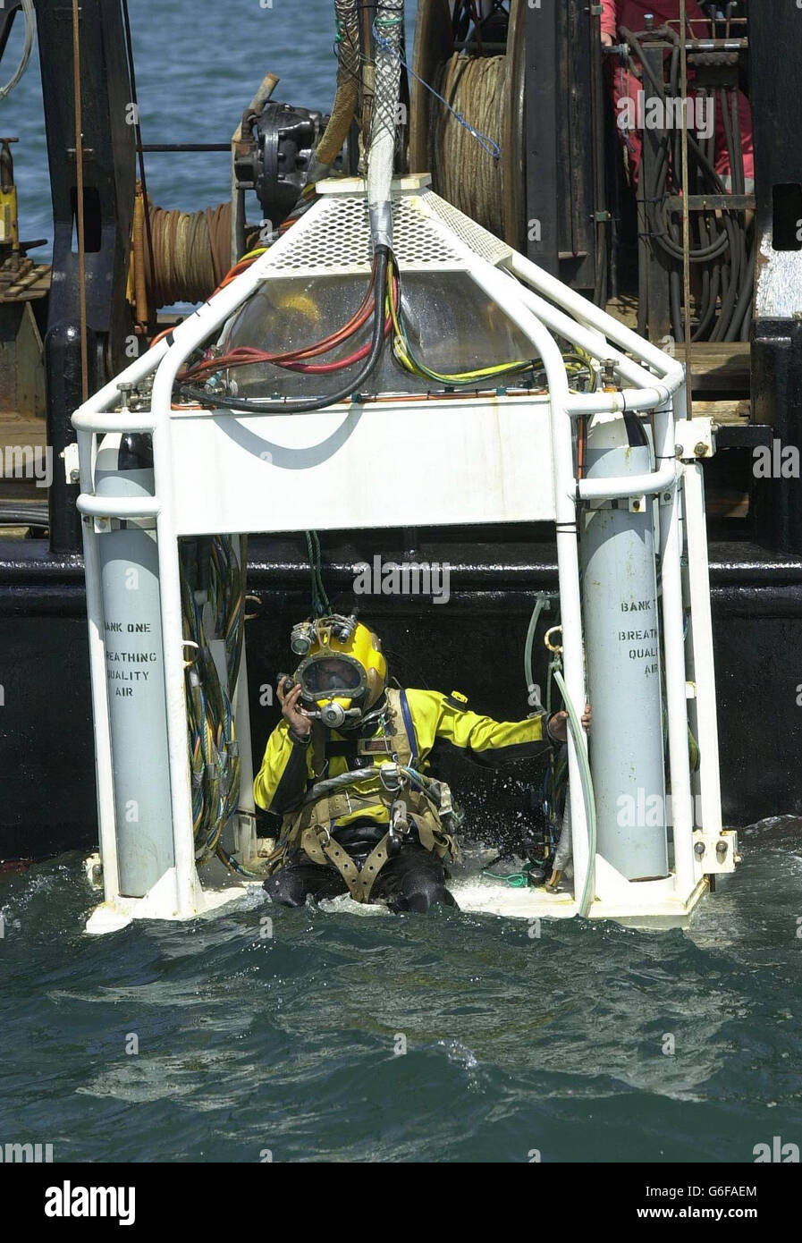 Diver Pete Magowan prepares to go down the site of the Mary Rose in the Solent, Portsmouth, on the 21st anniversary of the raising of Henry's VIII's warship. *..The archaeological dives at the request of the Ministry of Defence form part of a survey ahead of plans to regenerate Portsmouth naval base. Secondly, it will excavate items that had to be left buried at the wreck site because of time and money pressures during the original project to raise the ship. Stock Photo