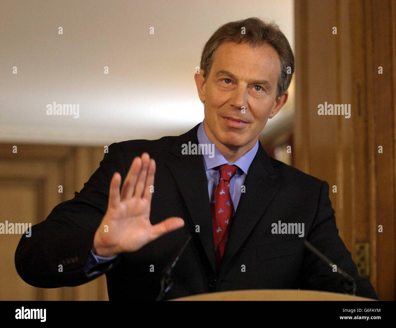 Britain's Prime Minister Tony Blair makes a point as he addresses the media during his monthly televised news conference in Downing Street in London. Blair accepted that he needed to rebuild public trust following the war in Iraq and the death of Government weapons expert David Kelly. Stock Photo