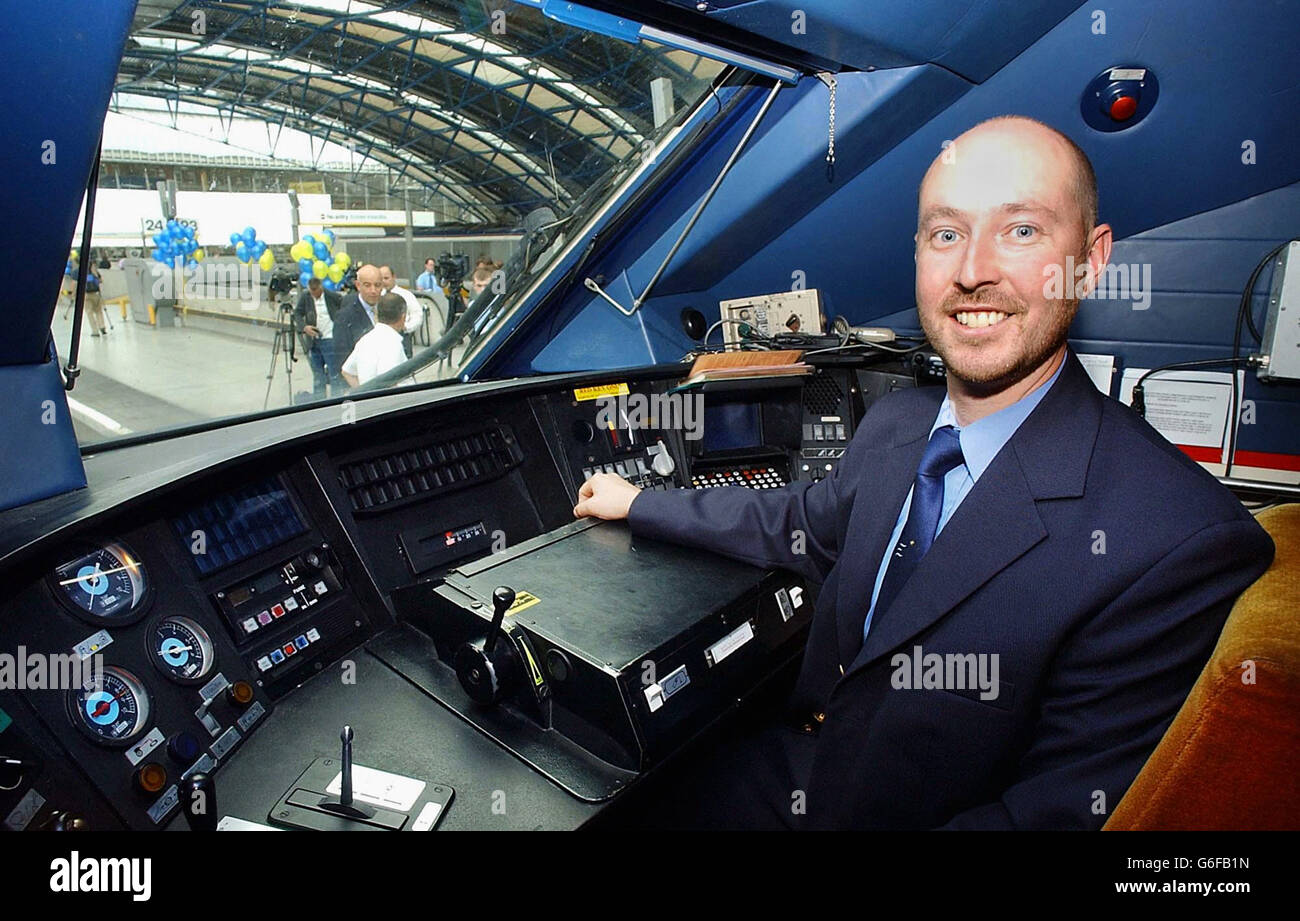 Eurostar driver Alan Pears inside his train at Waterloo station, London