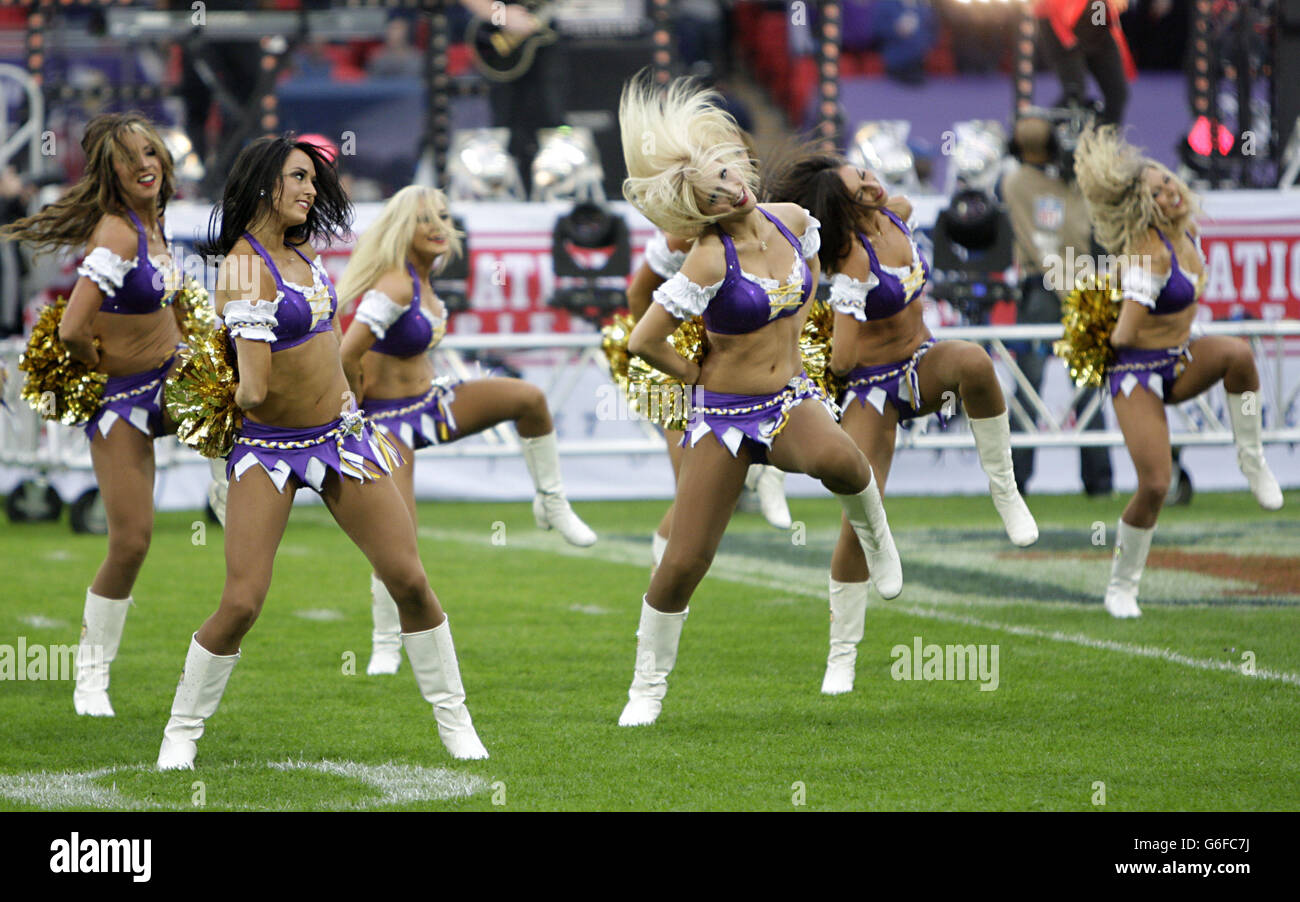 Minnesota Vikings cheerleaders perform prior to the NFL International Series match at Wembley Stadium, London. Stock Photo