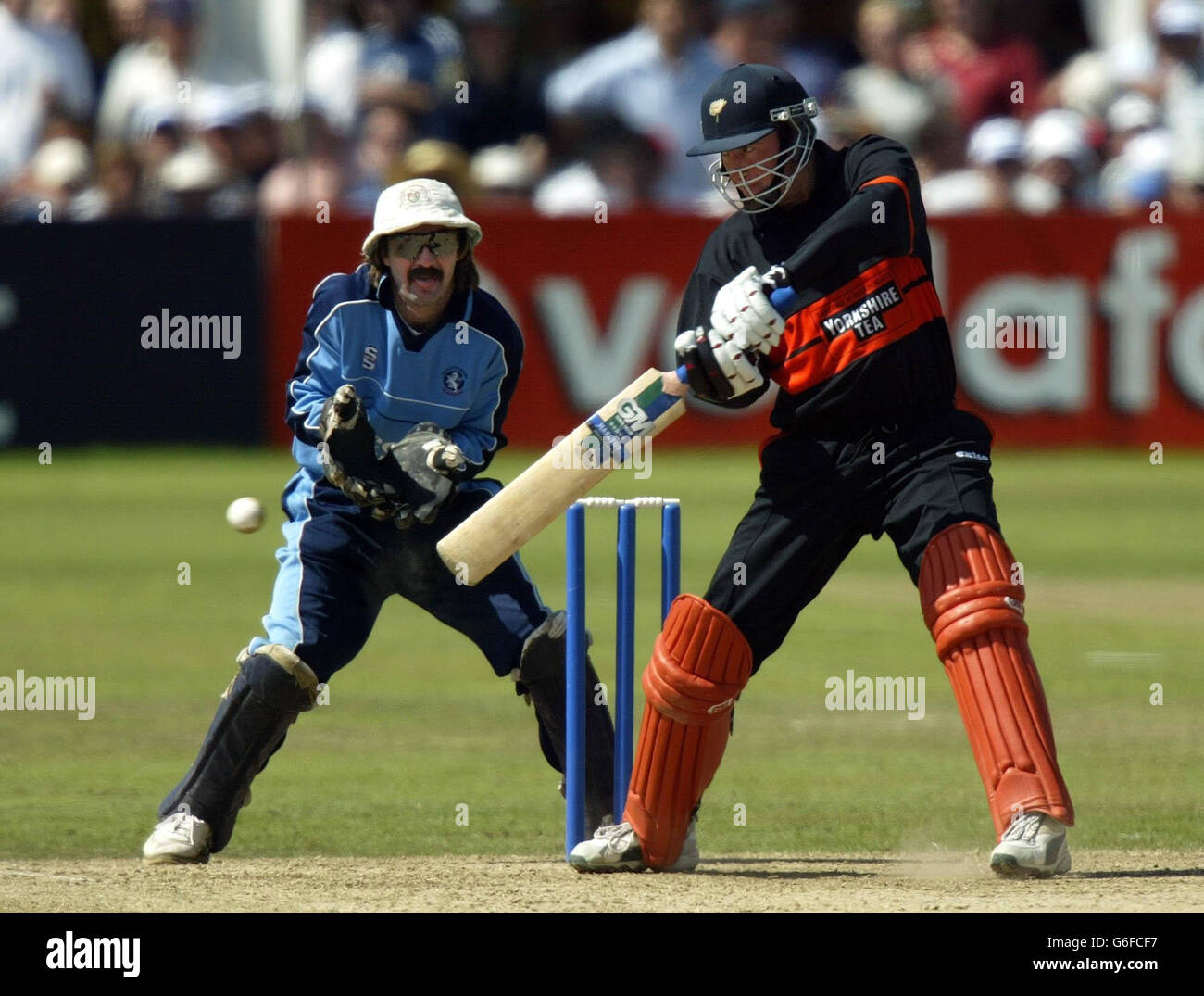 Yorkshire's Craig White cuts a delivery during his innings of 27 in the National League Division One match at the Cheltenham College Ground, Cheltenham. Stock Photo