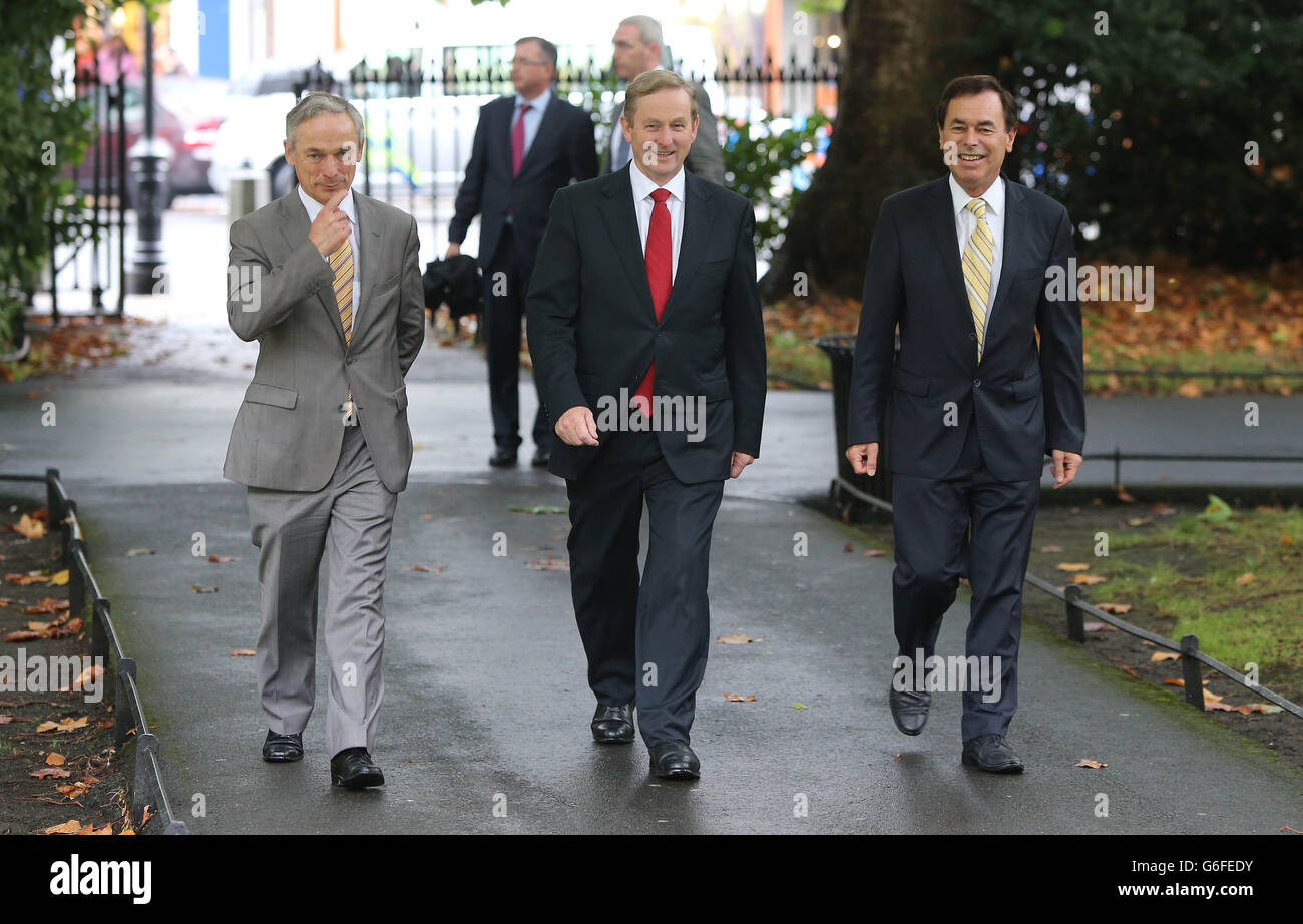 (Left to right) Richard Bruton, Taoiseach Enda Kenny and Alan Shatter take part in a photocall calling for a Yes vote in Friday's referendum in St Stephen's Green in Dublin. Stock Photo