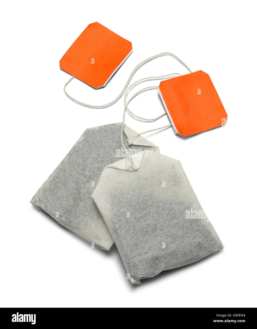 Two Tea Bags with Copy Space Isolated on White Background. Stock Photo