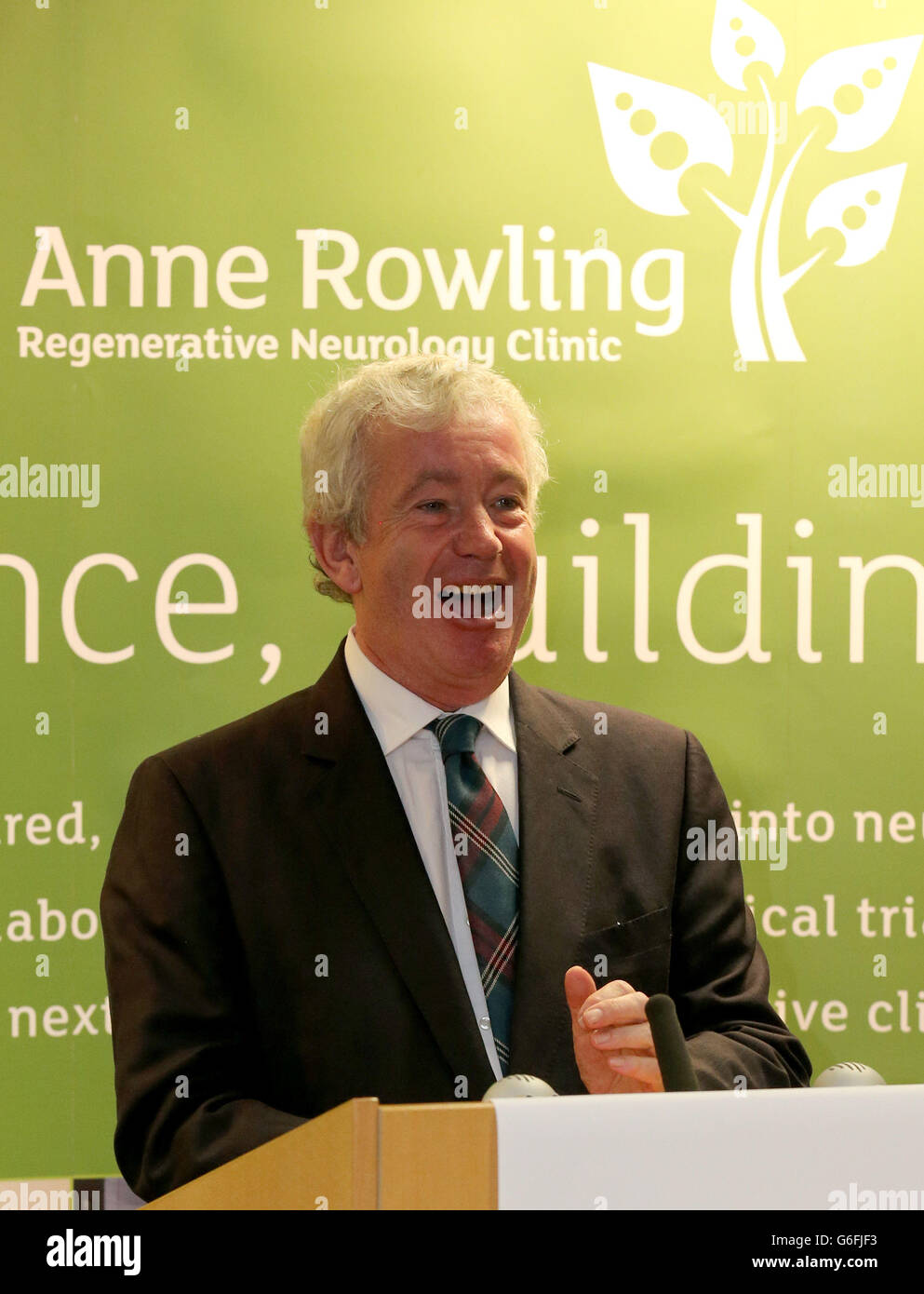 University Principle Sir Timothy O'Shea speaks during the opening of The Anne Rowling Regenerative Neurology Clinic at Edinburgh University. Stock Photo