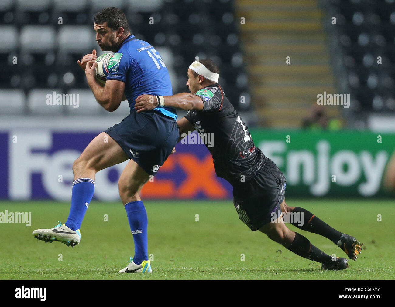 Leinster's Rob Kearney catches high ball as Ospreys's Eli Walker tackles, during the Heineken Cup match at the Liberty Stadium, Swansea. Stock Photo