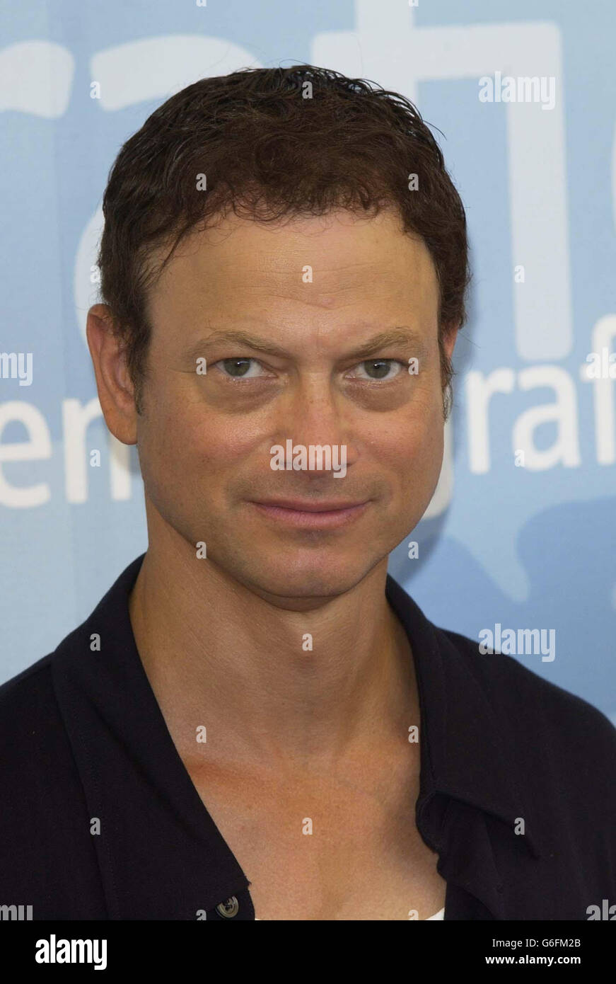 American actor Gary Sinise poses for photographers to promote his new film 'The Human Stain' at Mostra Internazionale d'Arte Cinematografica Lido in Venice, Italy, during the 60th annual Venice Film Festival. Stock Photo