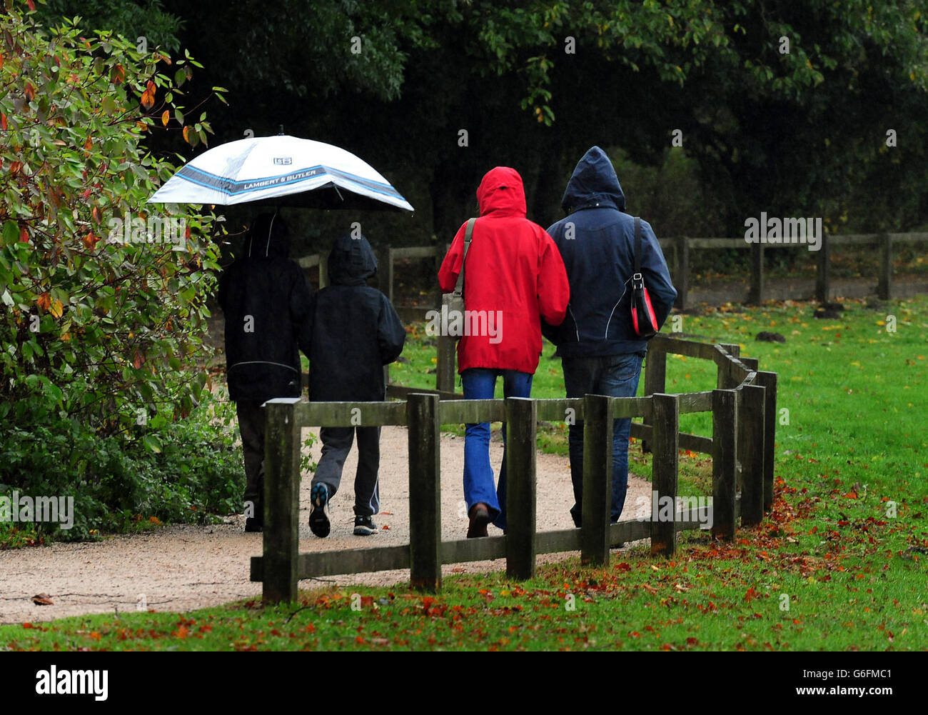 People brave the rain at Rufford Abbey, Ollerton, Nottinghamshire. Stock Photo