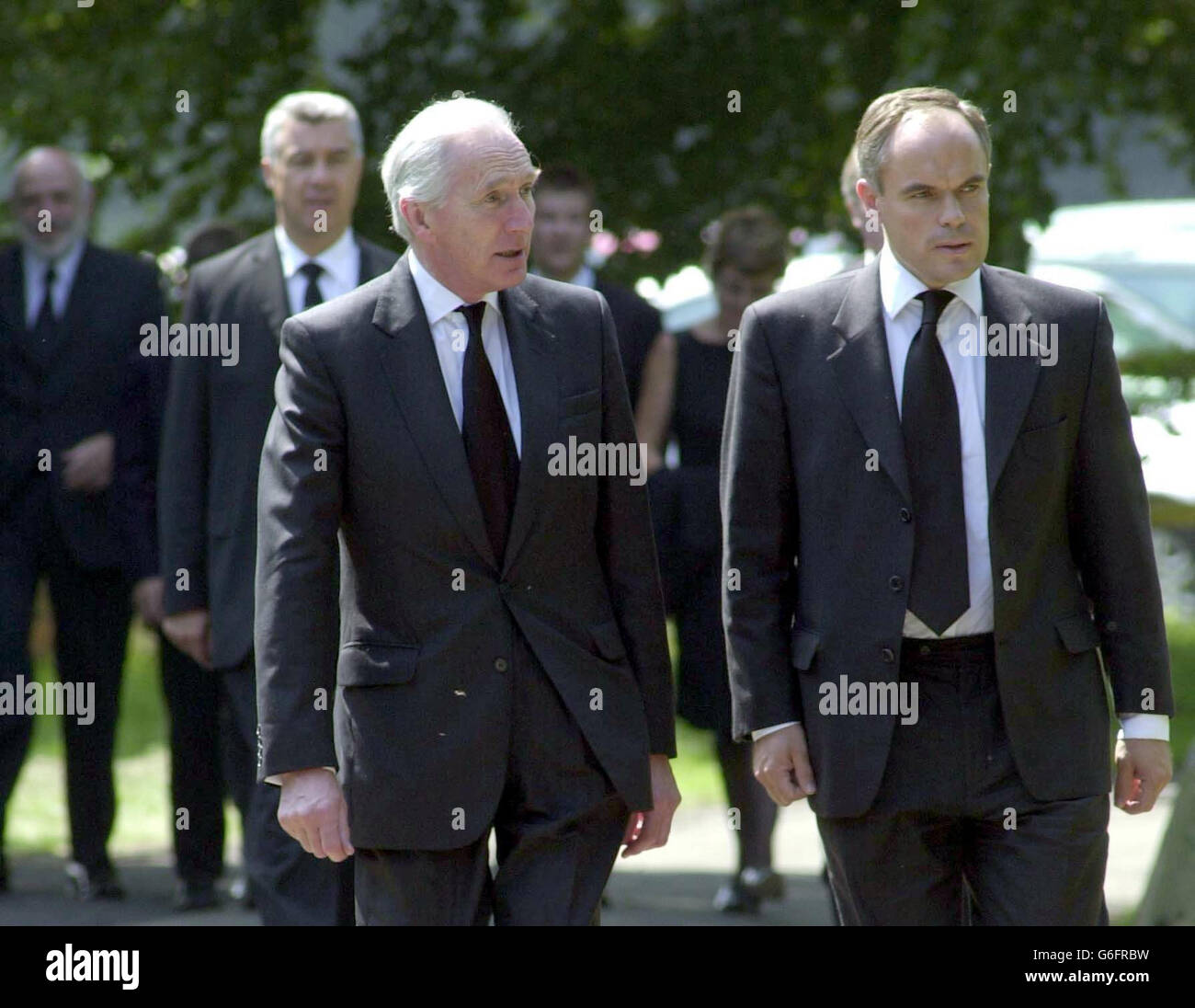 Lord Hutton (left) arrives at St Mary's Church in Longworth, Oxfordshire for the funeral of Government weapons expert Dr David Kelly. The private funeral for Dr Kelly is being held overlooking the spot where he apparently committed suicide. Stock Photo