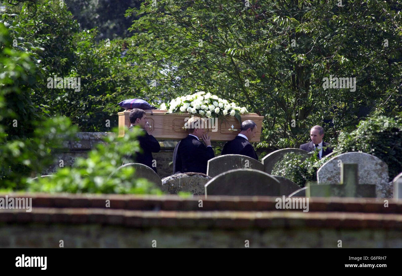 Pallbearers carry the coffin of Government weapons expert Dr David Kelly at St Mary's Church in Longworth, Oxfordshire. Around 160 mourners including Deputy Prime Minister John Prescott and Lord Hutton, who is leading the inquiry into Dr Kelly's apparent suicide, had arrived earlier. Stock Photo