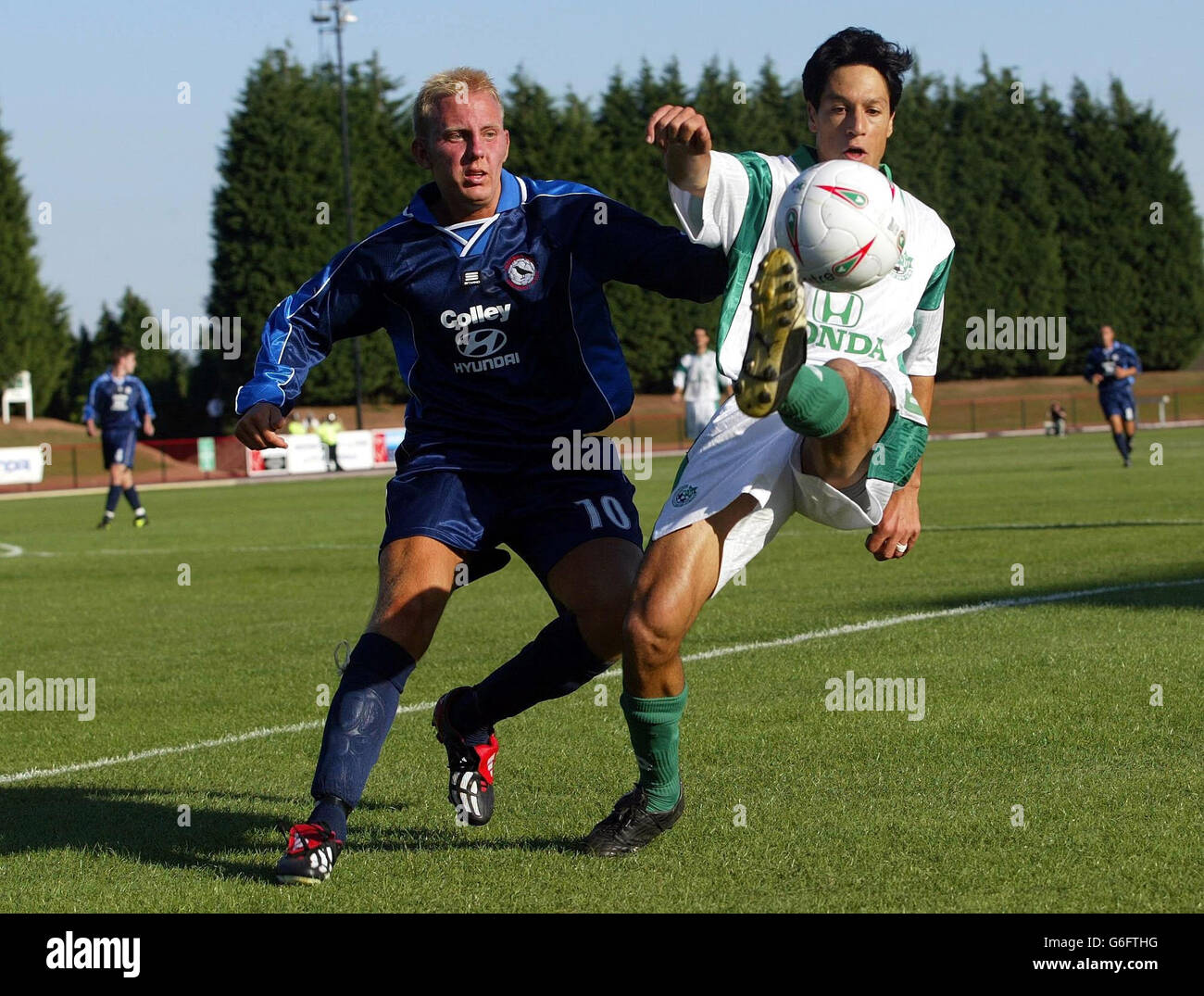 Idan Tal of Maccabi Haifa is under pressure from Kevin Wallace of Cwmbran Town during the UEFA Cup Prelimary round match at Cwmbran Stadium. Stock Photo