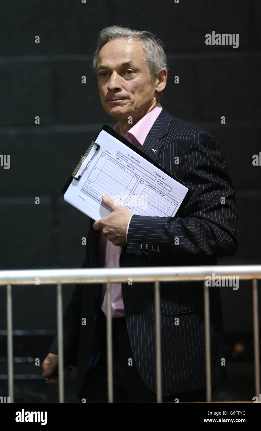 Fine Gael's Richard Bruton is seen as counting of votes in the referendums on the future of the Seanad and the establishment of a new Court of Appeal is getting under way at the RDS in Dublin this morning. Stock Photo