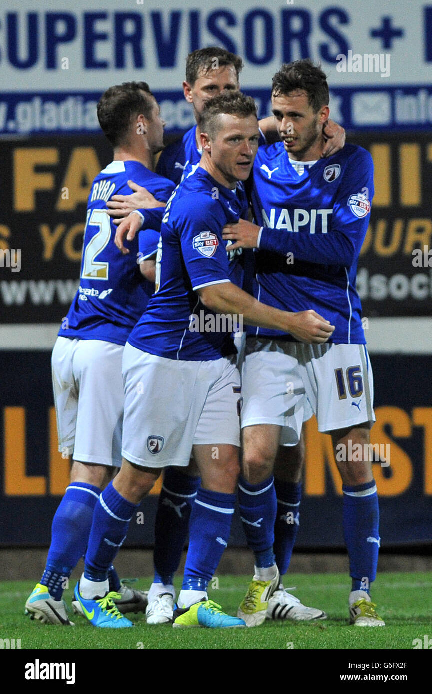 Soccer - Johnstones Paint Trophy - Mansfield Town v Chesterfield - One Call Stadium. Chesterfield's Gary McSheffrey (left) celebrates scoring his teams opening goal with teammates Stock Photo