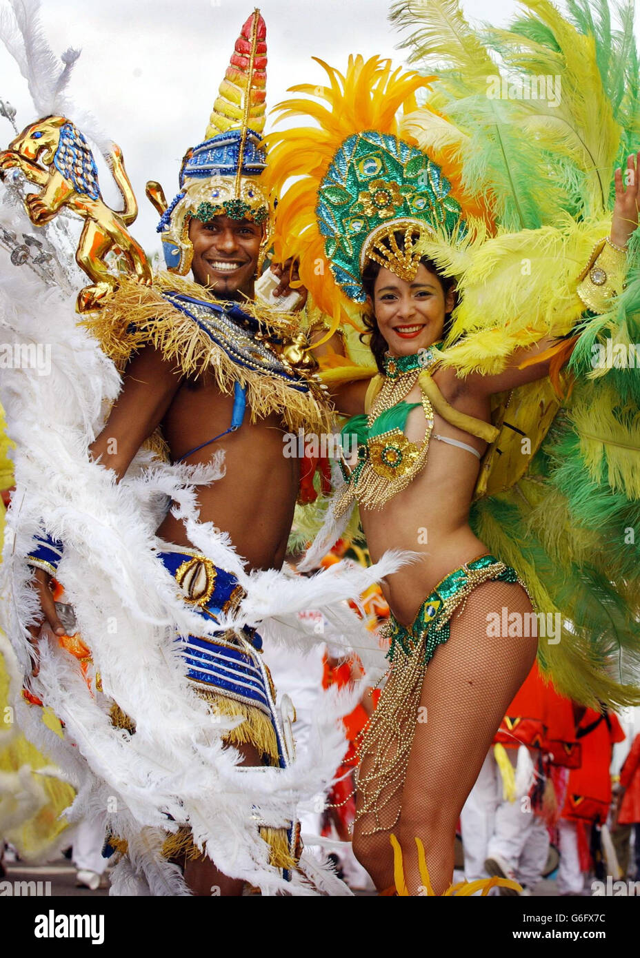 Dancers from the Paraiso dos Orixas Dance School, Rio de Janerio, Brazil, at the Notting Hill carnival in London. Around one million revellers were expected at the final day of the Notting Hill Carnival which kicked off at noon in a burst of vibrant colour, elaborate costumes and thunderous Caribbean music.Europe's largest and most celebrated street party, which has been taking place in London for the last 38-years, was reaching its pinnacle with the heart of West London becoming a kaleidoscope of the best in contemporary urban music. Stock Photo