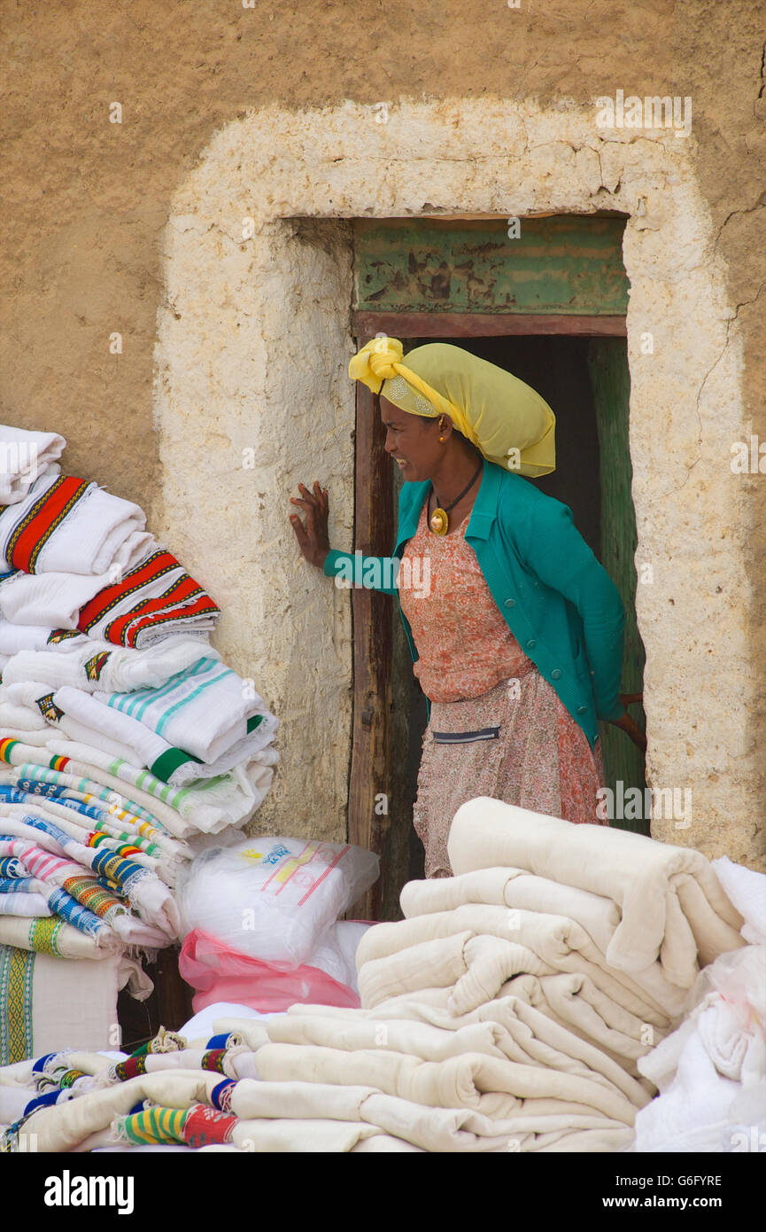 Fabrics vendor. Market day at Freweyni also known as Sinkata. Tigray, Misraqawi Zone,  Saesi Tsaedaemba District, Ethiopia Stock Photo