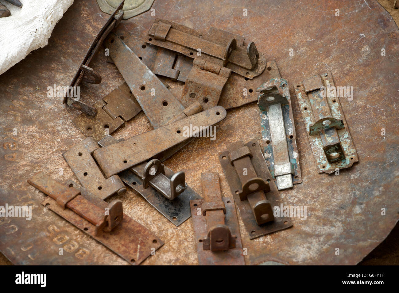 Selection of ironmongery - locks and hinges for sale. Market day at Freweyni also known as Sinkata. Tigray,  Ethiopia Stock Photo