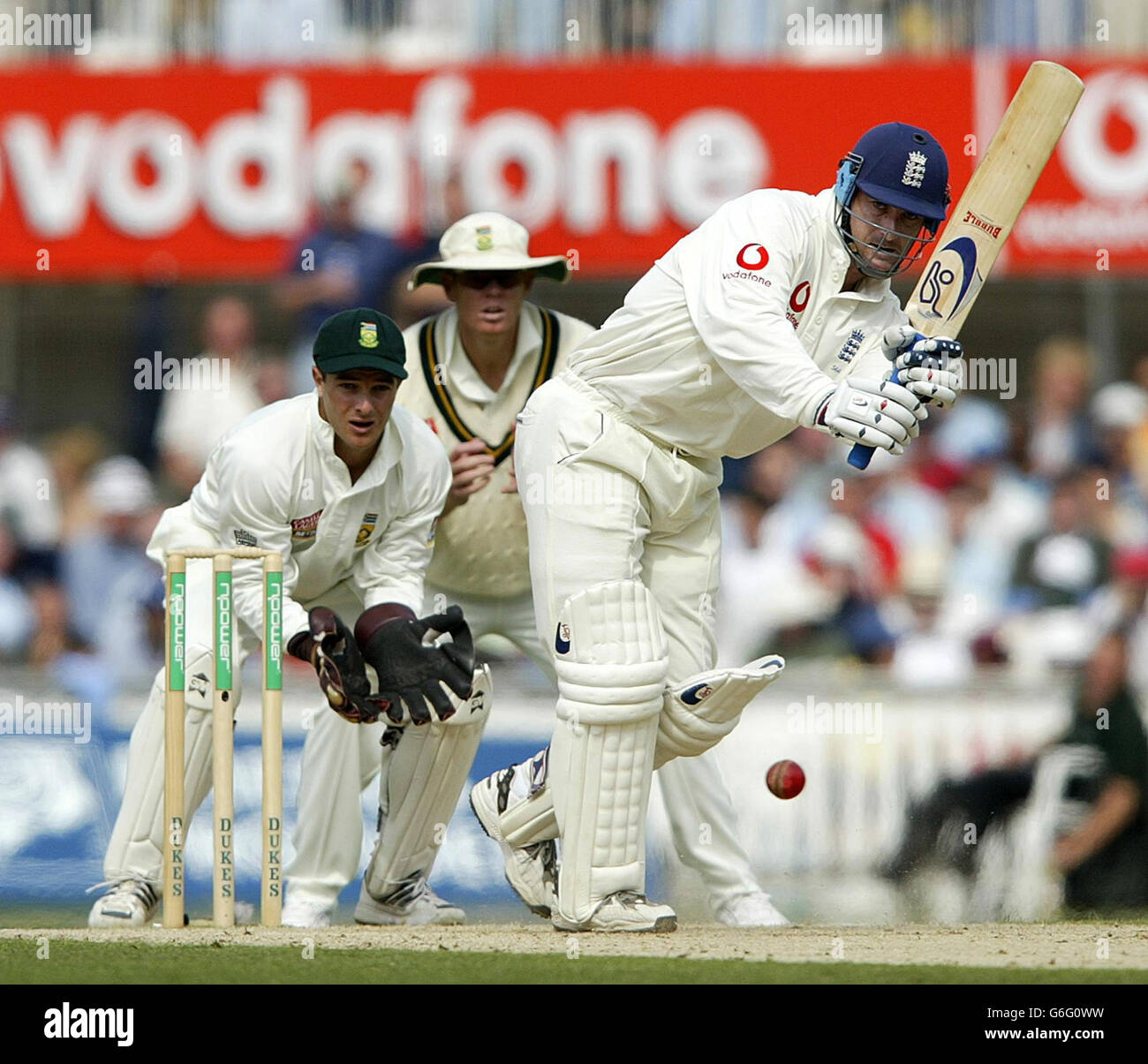 England Graham Thorpe play's a shot off the bowling of South Africa's Paul Adams, watced by wicket keeper Mark Boucher and Shaun Pollock during the 5th npower test at The Oval, London. Stock Photo