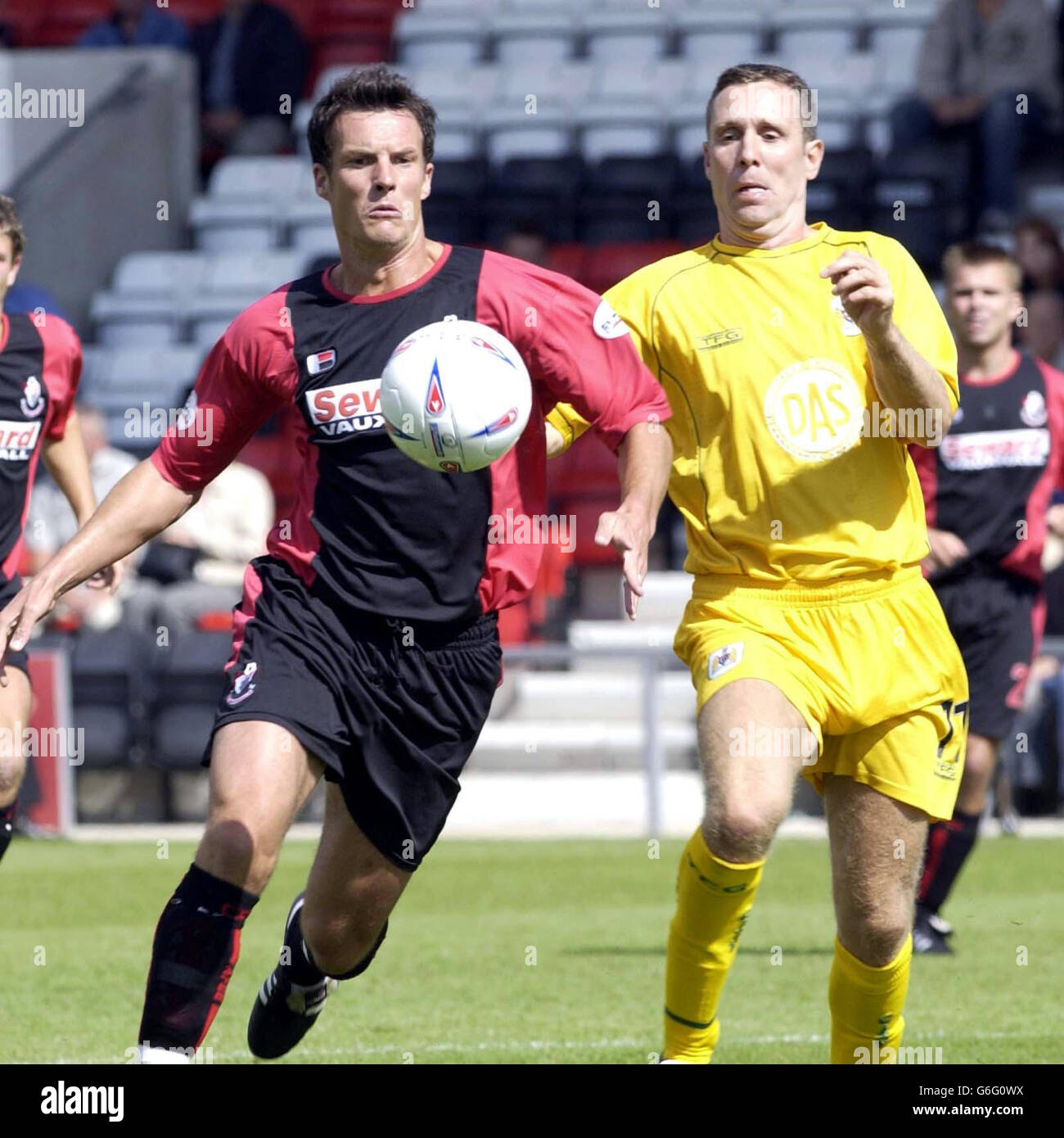 Bournemouth's Marcus Browning and Bristol's Brian Tinion during their