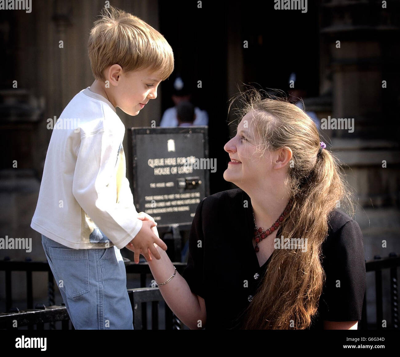 Diane Blood and her four-year-old son Liam outside the House Of Lords in London. Diane, the widow who fought for the right to have children using her dead husband s sperm, is expected to win her long legal battle later today to have her late partner legally recognised as the father. Mrs Blood, 36, from Worksop, is at the House of Lords in the hope a new law will be agreed that means the dead fathers of children born from frozen sperm are recognised on birth certificates. Stock Photo