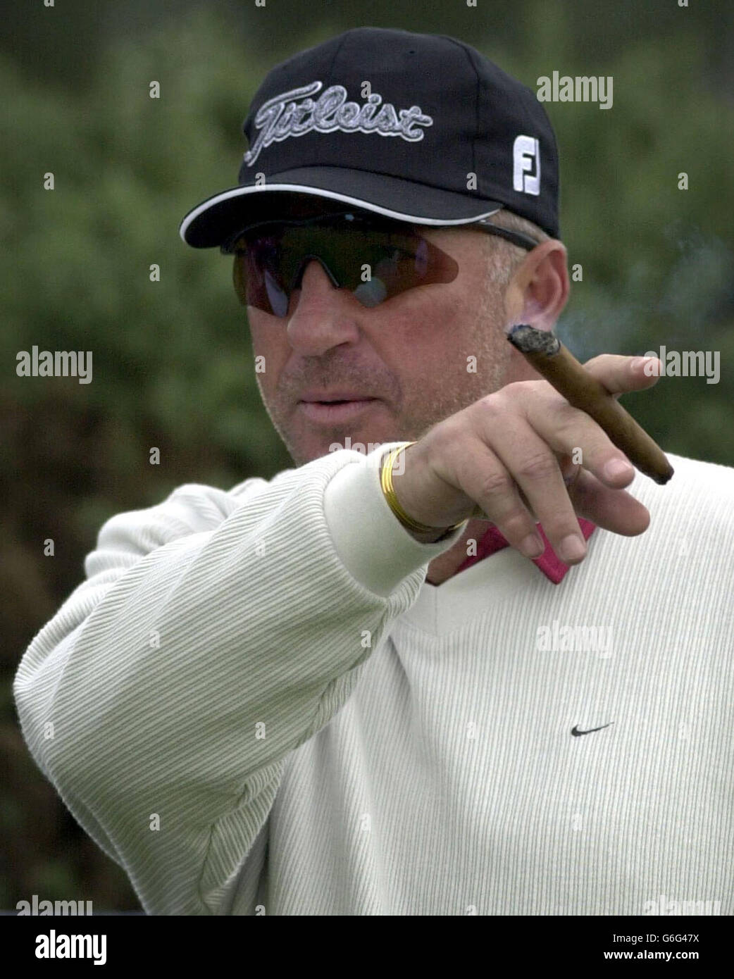 Ian botham smoking a cigar hi-res stock photography and images - Alamy