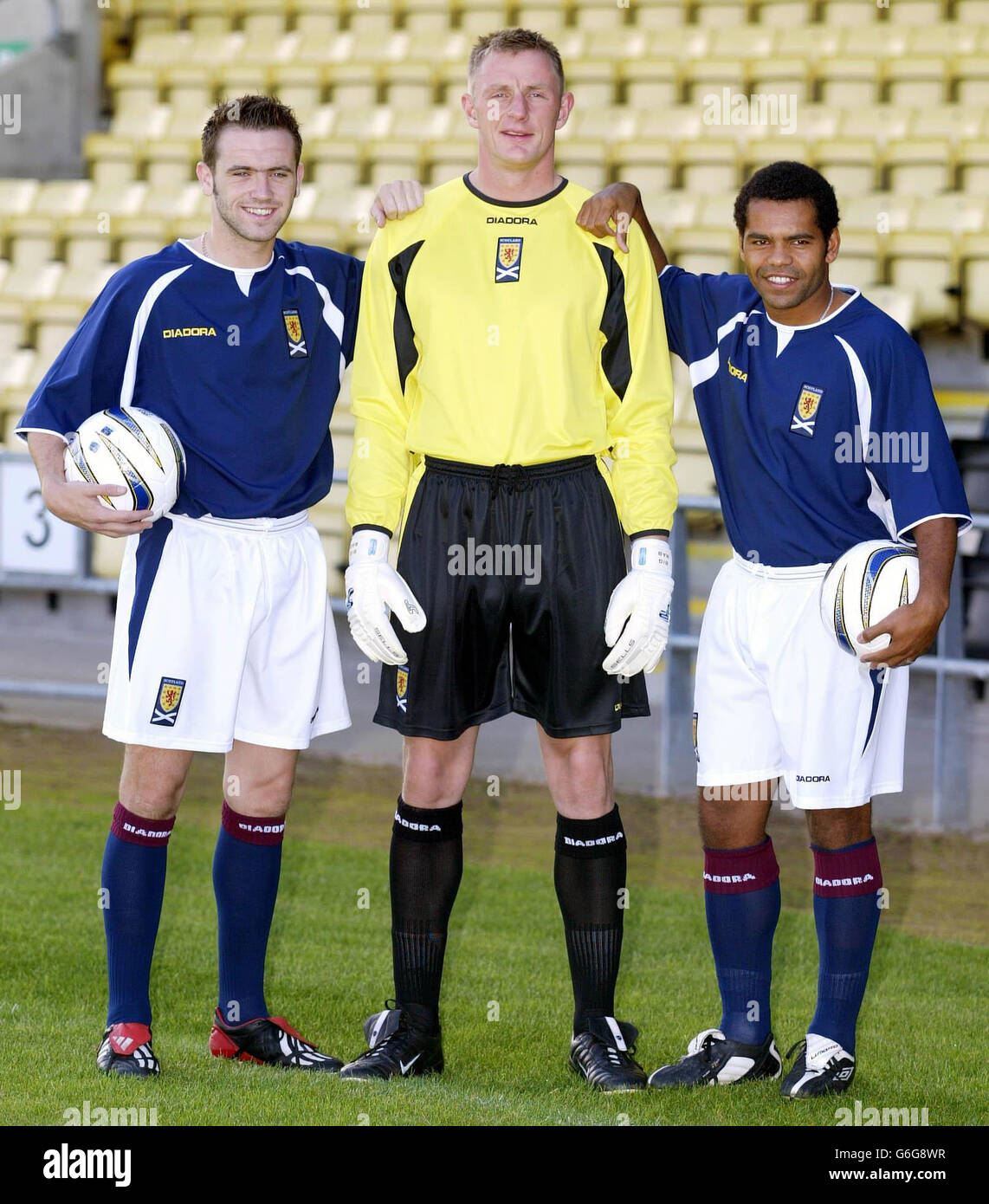 From left - Scotland players Rab Douglas, James McFadden and Kevin Harper wear the new home kit at Strathclyde Homes Stadium, Dumbarton, prior to the group 5 qualifying match against the Faroe Islands. Stock Photo