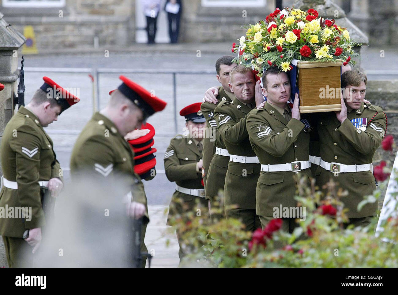 The coffin of military policeman Warrant Officer Colin Wall, 34, who ...