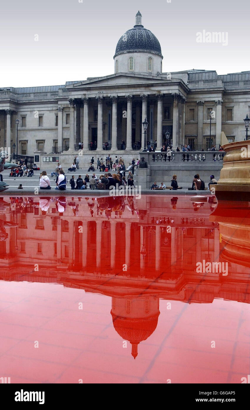 Trafalgar Square fountain dyed red Stock Photo