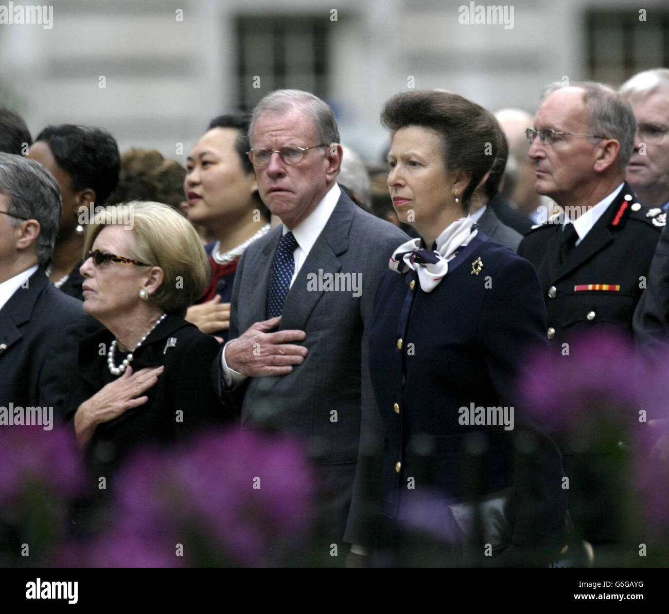 The Princess Royal with US ambassador William Farish and his wife at the memorial garden in Grosvenor Square, London, dedicated to the memory of those who died when two hijacked passenger jets that crashed into the twin towers of New York's World Trade Centre. * The garden of remembrance contains a small pavilion bearing three bronze plaques, listing the names of victims for the UK, UK Overseas Territories and those with dual nationalities. Stock Photo