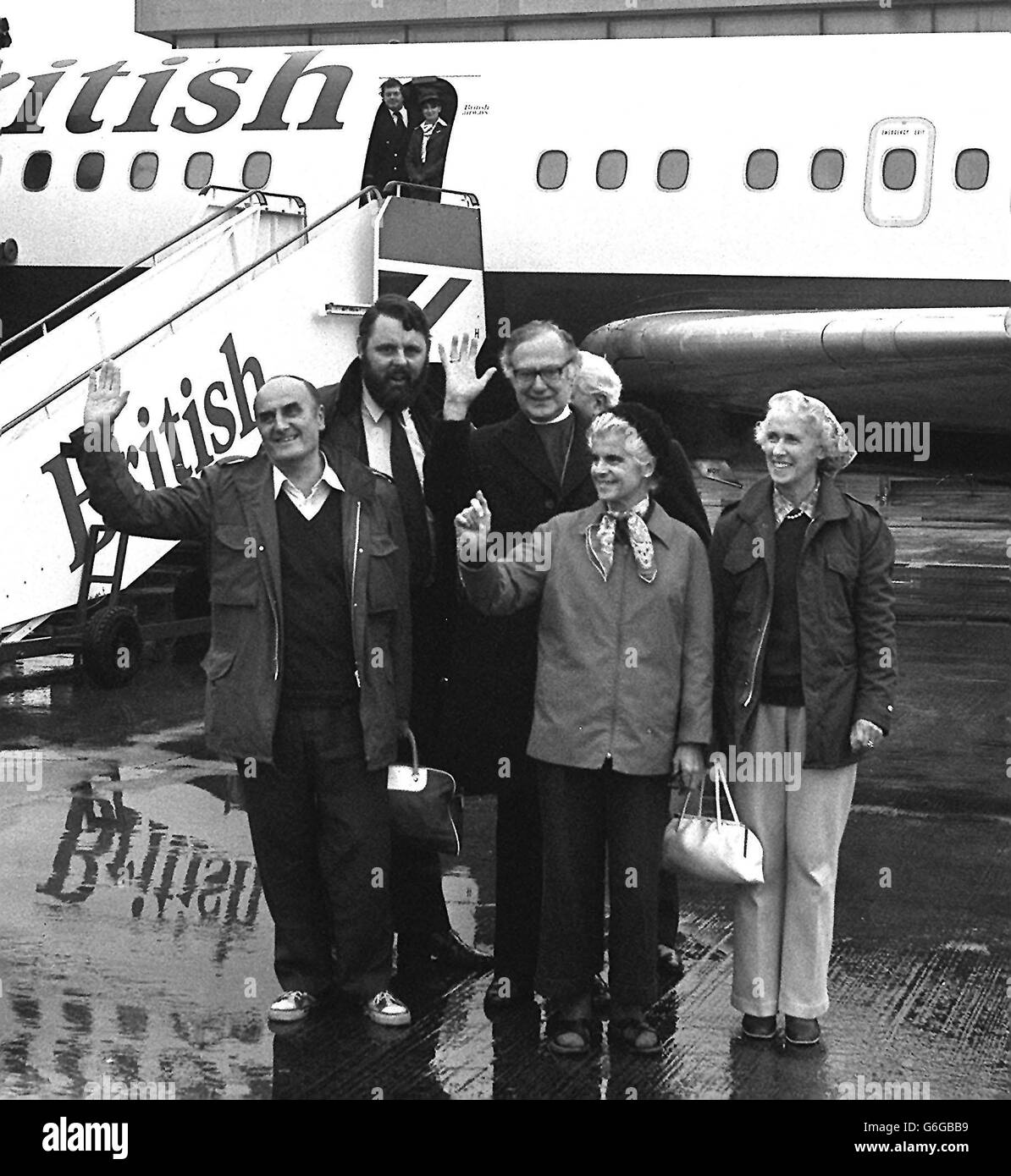 Miss Jean Waddell at Heathrow Airport after the release from captivity in Iran of the three Anglicans. Behind her is Mrs Audrey Coleman, with Dr John Coleman, her husband, and Dr. Runcie, the Archbishop of Canterbury. Mr Terry Waite (beard). Stock Photo