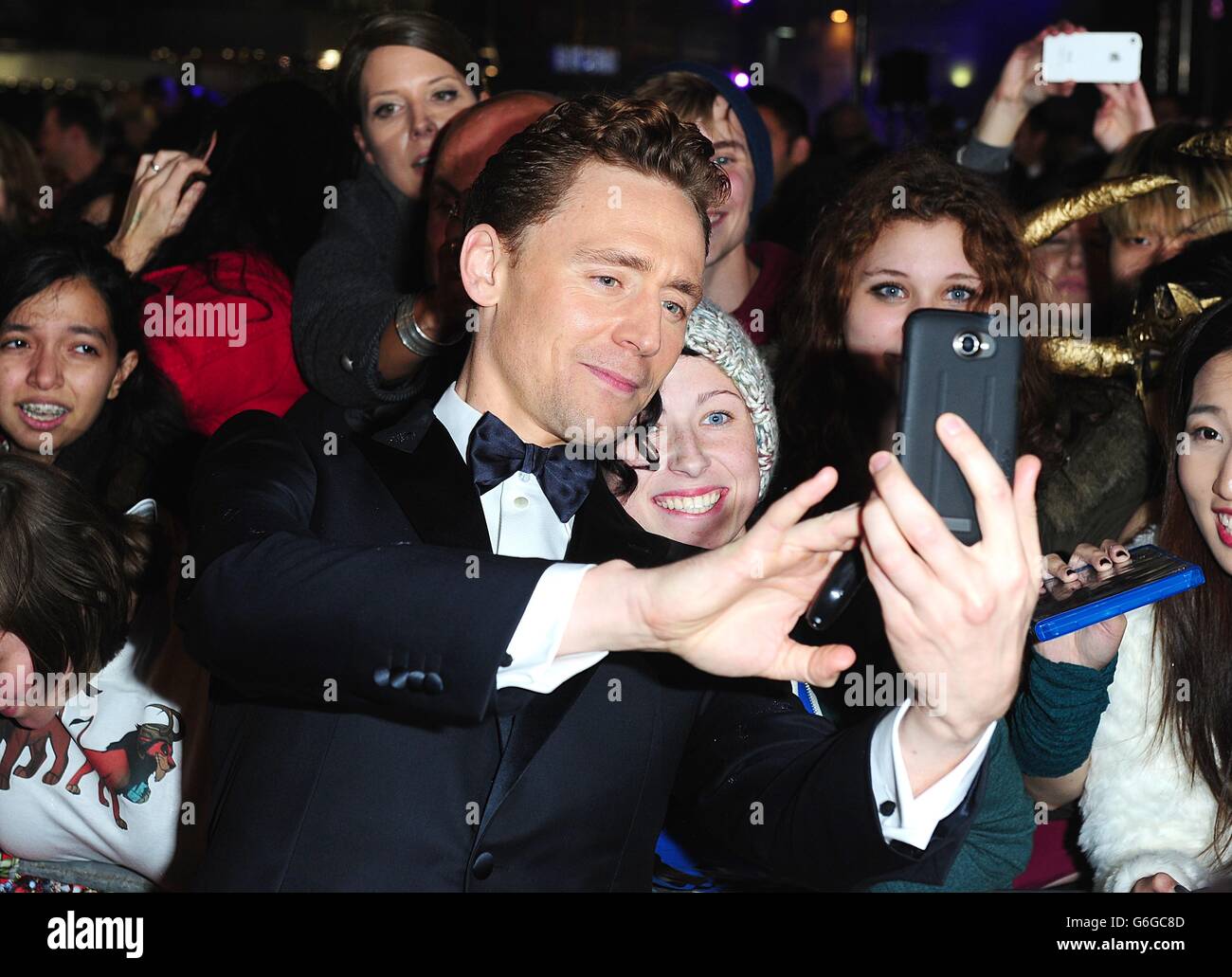 Tom Hiddleston arriving for the World Premiere of Thor : Dark World, at the Odeon Leicester Square, London. Stock Photo