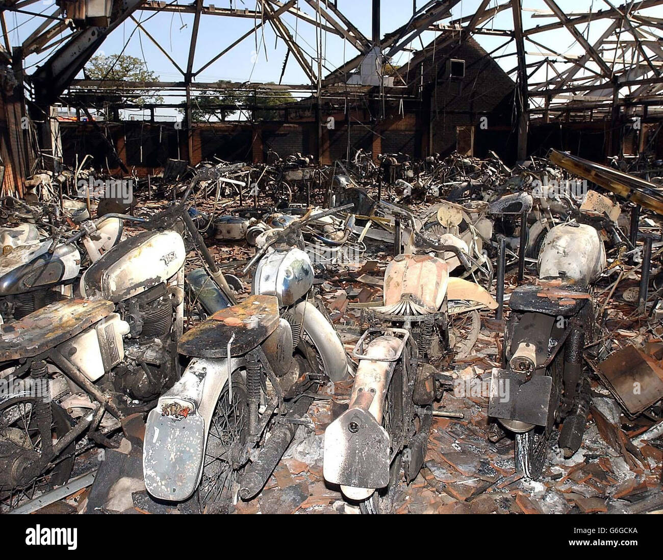Scores of ruined classic motorbikes at the National Motorcycle Museum near Birmingham, after a fire caused by a discarded cigarette caused damage expected to total 14million. Although more than 400 of the 800 exhibits at the attraction were saved in yesterday's blaze, those lost are estimated to be worth up to 9 million. Spokesman Ken Wilson said insurers had yet to put a figure on the damage, but it was likely that replacing the gutted building would cost another 5 million. Hundreds of vintage motorbikes, many of them irreplaceable, were wiped out in the blaze. Stock Photo