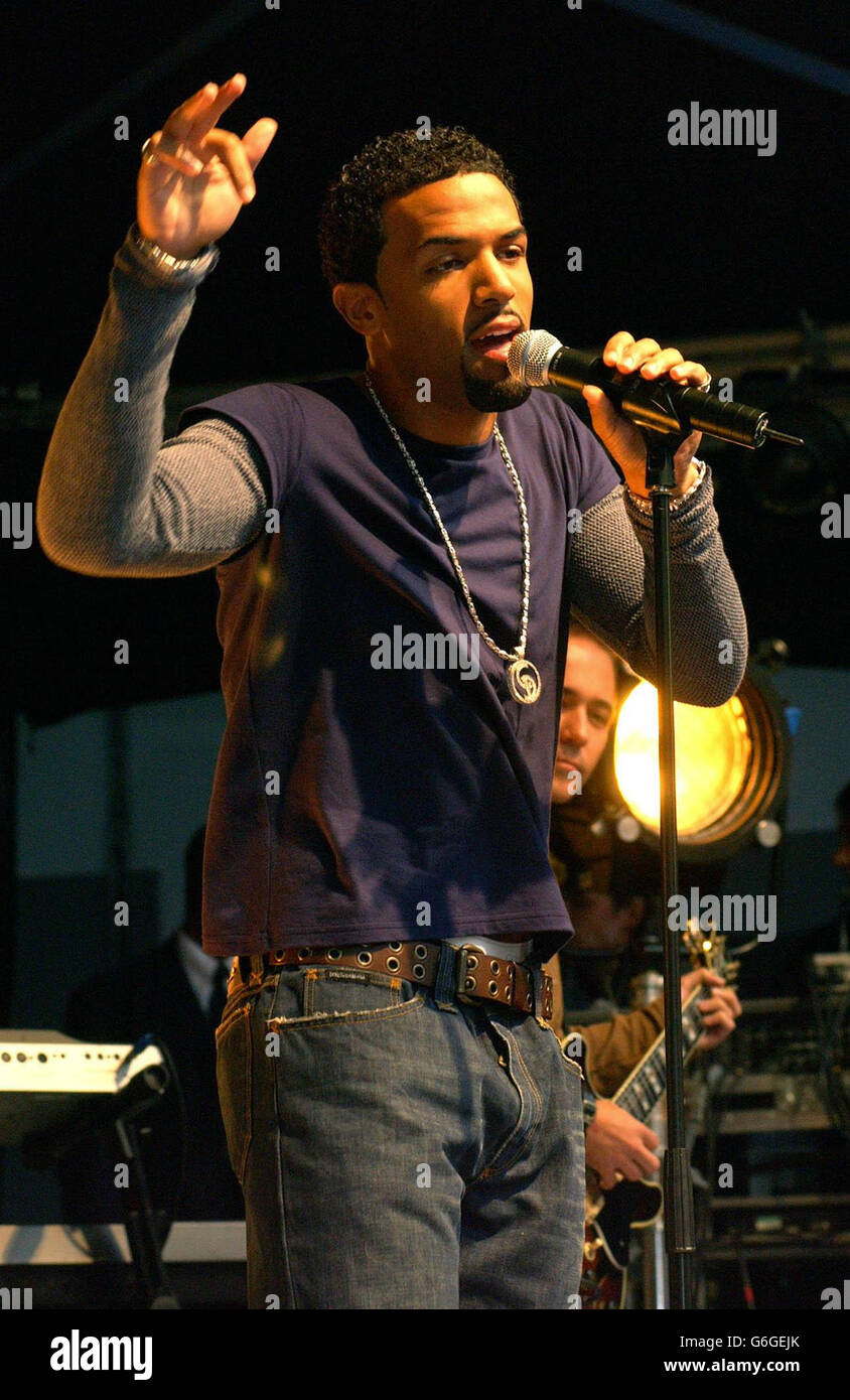 Craig David during his apperance on MTV's TRL UK at the MTV Studios in Camden, north London. The singer was performing his new single 'World Filled With Love' due for release 13 October 2003. Stock Photo