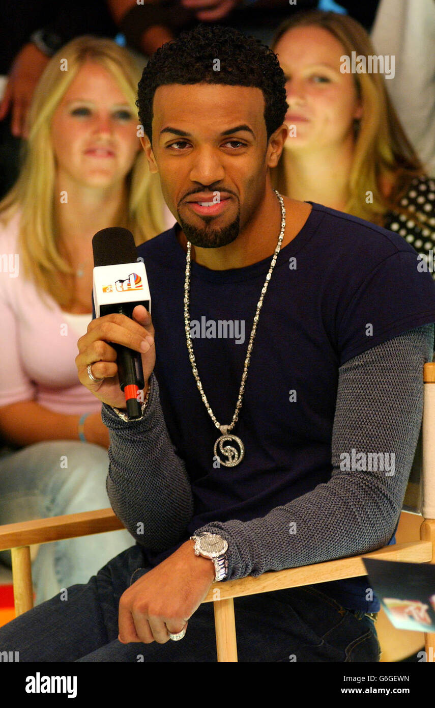 Craig David during his apperance on MTV's TRL UK at the MTV Studios in Camden, north London. The singer was performing his new single 'World Filled With Love' due for release 13 October 2003. Stock Photo