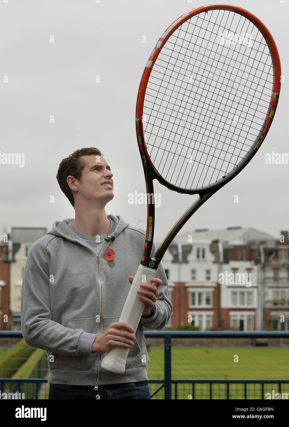 Andy Murray poses with a giant Head tennis racket during a photocall at The  Queens Club, London Stock Photo - Alamy