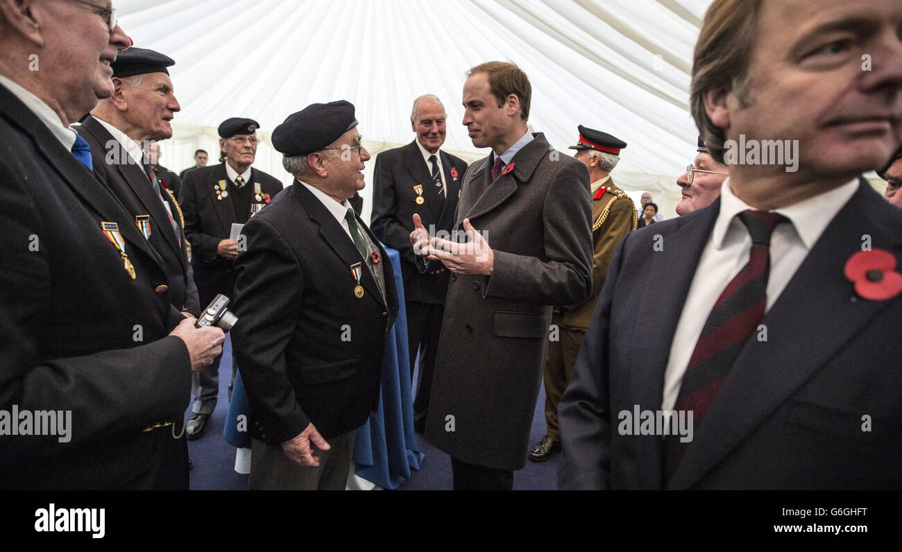 The Duke of Cambridge talks to British veterans of the Korean war following a Korean War Memorial Ground-breaking Ceremony, at Victoria Embankment Gardens in central London. PRESS ASSOCIATION Photo. Picture date: Tuesday November 5, 2013. See PA story ROYAL Korea. Photo credit should read: Richard Pohle/The Times/PA Wire Stock Photo